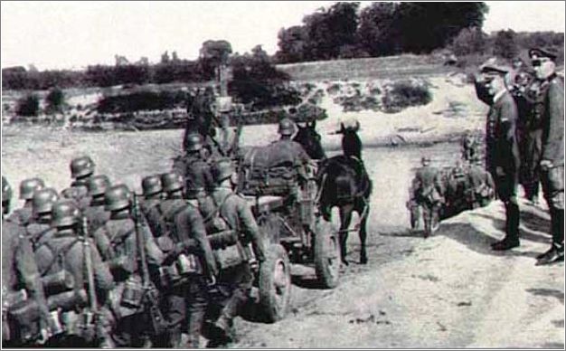 Photo of Hitler reviewing troop movement from the west bank of the San river near Przemysl